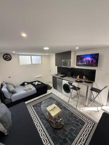 Appartements SUPERBE STUDIO PROCHE PARIs : photos des chambres