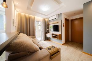 Aconchego e privacidade para sua família com 2 quartos, sala e cozinha integrados e sacada com churrasqueira