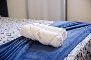 Aconchego e privacidade para sua família com 2 quartos, sala e cozinha integrados e sacada com churrasqueira