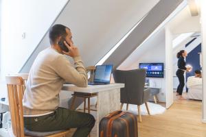 Appartements Le Perchoir, avec parking, face aux Thermes : photos des chambres