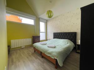 Maisons de vacances Modern and Bright home walk to beach with garage : photos des chambres