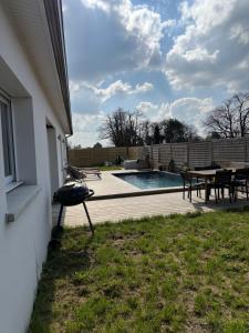 Villas Aux portes de bordeaux Maison cocooning avec Piscine : photos des chambres