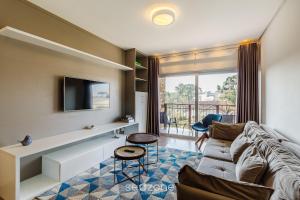 Belo apartamento com piscina aquecida CAP0302