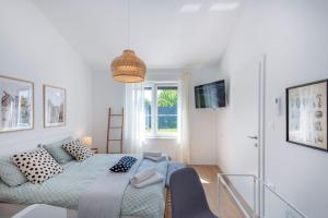 Villa The Pool House, a lush modern villa with a pool