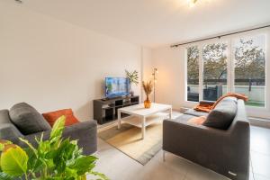Appartements Maison de ville avec terrasse Proche metro : photos des chambres