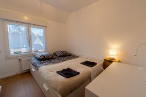 Appartements Maison de ville avec terrasse Proche metro : photos des chambres