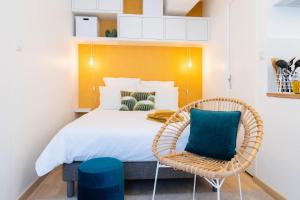 Appartements Le Palm Spring - studio cosy en centre-ville : photos des chambres