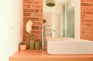 Appartements Oasis Cachee - Jacuzzi et cinema : photos des chambres