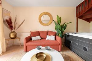 Appartements Oasis Cachee - Jacuzzi et cinema : photos des chambres