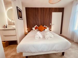 Appartements Le PRESTIGE du SANCTUAIRE : photos des chambres
