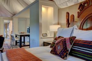 The Covery the Wren House a luxury African tent retreat on stocked bass pond