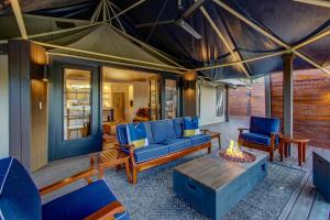 The Covery the Wren House a luxury African tent retreat on stocked bass pond