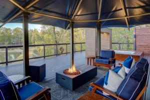 The Covery the Wren House a luxury African tent retreat on stocked bass pond