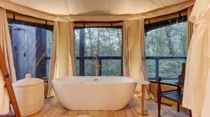 The Covery the Wren House a luxury African tent retreat on stocked bass pond