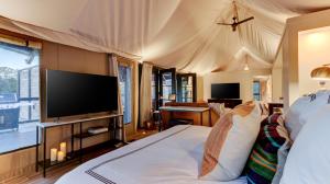 The Covery the Wren House a luxury African tent retreat on stocked bass pond