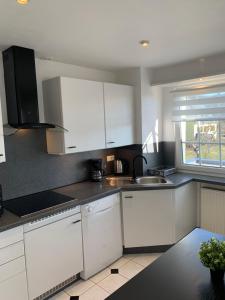 Appartements Au Petit Bonheur : photos des chambres