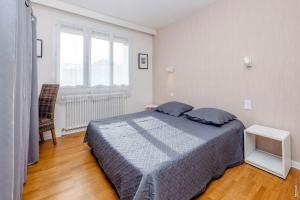 Appartements Grand Appartement de Coubertin - Calme - Albi : photos des chambres