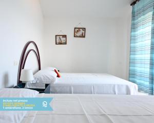 RS323 - Marcelli, bilocale fronte mare con spiaggia inclusa