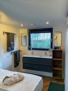 Lobsters Lodge in Heinkenszand Wellness Accommodation with Wood-Fired Hottub, Private Sauna and Outdoor Shower Aircos Free Wifi Complimentary Bed linen and Towels