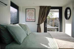 Lobsters Lodge in Heinkenszand Wellness Accommodation with Wood-Fired Hottub, Private Sauna and Outdoor Shower Aircos Free Wifi Complimentary Bed linen and Towels