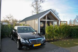 Lobsters Lodge in Heinkenszand Wellness Accommodation with Wood-Fired Hottub, Private Sauna and Outdoor Shower Aircos Free Wifi Complimentary Bed linen and Towels