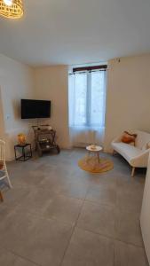 Appartements Le petit Mauperthuis F3 : photos des chambres