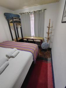 Casinha - Quarto Itacolomi