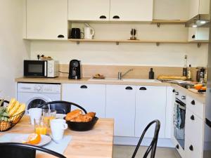 Appartements Au son de l-eau : photos des chambres