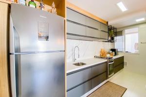 Viva o Paraíso Apto na Praia de Palmas - 0221