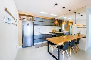 Viva o Paraíso Apto na Praia de Palmas - 0221