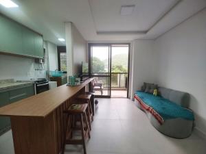 Apto metros da Praia de Palmas - 0229