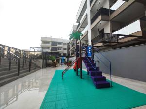 Apto metros da Praia de Palmas - 0229