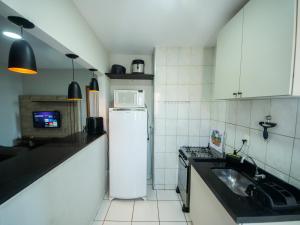 Apto com estacionamento, piscina e churrasqueira