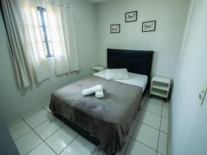 Apto com estacionamento, piscina e churrasqueira