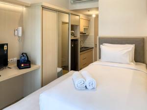 Simply Studio at Tokyo Riverside PIK 2 Apartment By Travelio