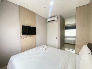 Cozy 1BR Apartment at Parahyangan Residence Bandung By Travelio