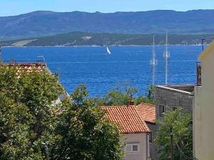 Balcony apartment with a sea view in town center
