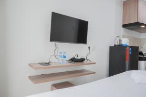 Simple and Cozy Living Studio at Serpong Garden Apartment By Travelio