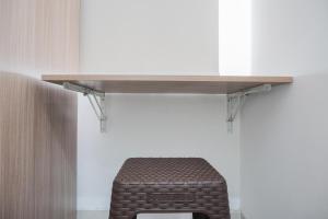 Simple and Cozy Living Studio at Serpong Garden Apartment By Travelio