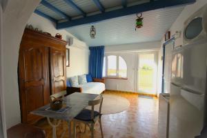 Appartements Le Poisson Bleu : photos des chambres