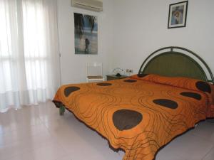 Spacious apartment with terrace and pool in Bibione