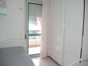 Spacious apartment with terrace and pool in Bibione