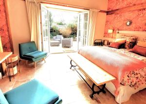 B&B / Chambres d'hotes Kergroaz Maner Classe 5 epis Table d'Hotes Manoir dans parc paysage, spa en plein air Bornes vehicules electriques Petit dejeuner inclus : photos des chambres