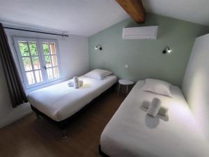 Villages vacances Les Garrigues de la Vallee des Baux : photos des chambres