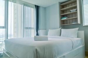 Elegant 1BR at Branz BSD City Apartment By Travelio