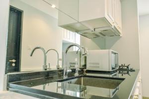 Elegant 1BR at Branz BSD City Apartment By Travelio