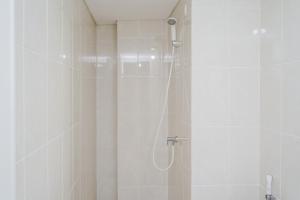 Comfortable and Nice 2BR Apartment at M-Town Residence By Travelio