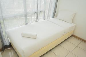 Comfortable and Nice 2BR Apartment at M-Town Residence By Travelio