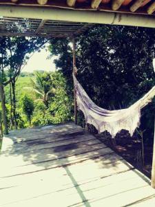 Sonho em Caraíva, praia com rio, vista da vila e mar