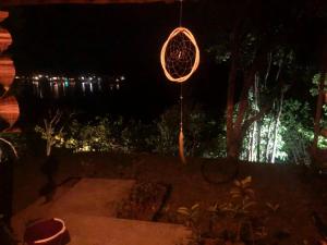 Sonho em Caraíva, praia com rio, vista da vila e mar